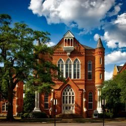 Captivating view of Clark Hall at the University of Alabama with its iconic brick facade.